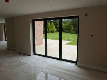 Internal view of our Centor C1 Bi folding doors , 7016 grey. triple glazed . Installtion Poynton cheshire.